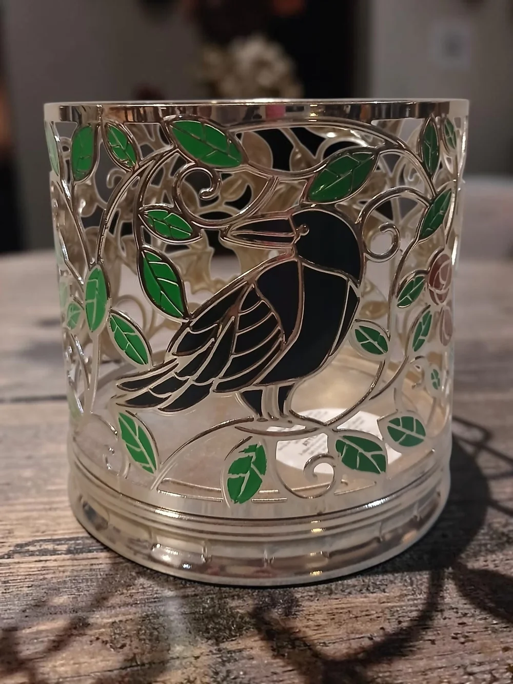 Decorative Silver Bird Candle Holder with Green Leaf Accents
